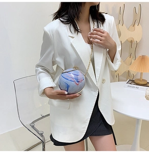 Chic spherical marbled handbag in blue and pink hues with gold chain shoulder strap