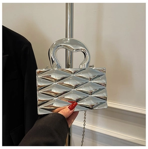 Silver metallic mini box bag with quilted diamond pattern and chunky metal handle
