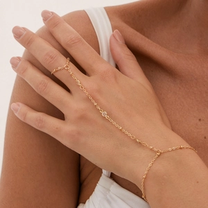 Bracelet bague élégant en or pour femme orné de trois accents en cristal rond
