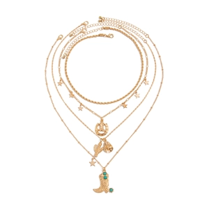 Layered gold necklace set with western charms like cowboy boot, hat and cactus pendants