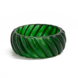 Modern emerald green resin bangle with twisted spiral texture and translucent finish