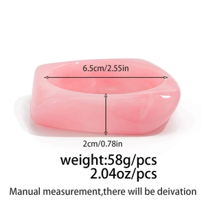 Detail view of pink marble resin bangle showing 6.5cm diameter and 2cm width dimensions