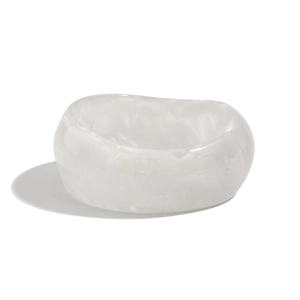 Chic irregular resin bangle featuring a white marble textured finish and wide bold design