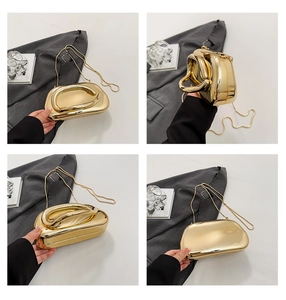 Detail view of gold mirror finish metal clutch bag showing four different angles and chain