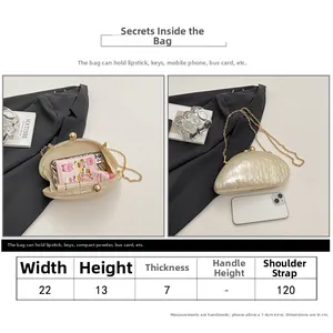 Detailed sizing guide for cream acrylic snail evening bag with chain strap and dimensions