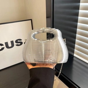 Silver metallic ripple handbag with rigid shell structure and elegant silver chain strap