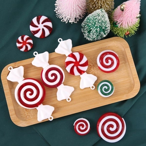 Close-up of red and white peppermint candy ornaments for DIY Christmas tree decor