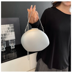 Silver irregular pebble acrylic clutch bag with matte finish and metal snake chain