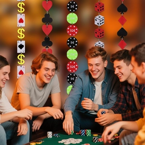 Close-up of casino party garlands with poker suits, colorful chips, and dice decorations