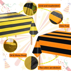 Waterproof striped party tablecloth in black and gold for birthday table decorations