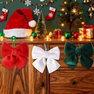 Three-piece velvet Christmas bows in red, white and green for tree decoration
