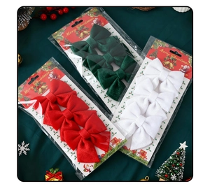 Three-piece velvet Christmas bows in red, green, and white colors for tree decoration