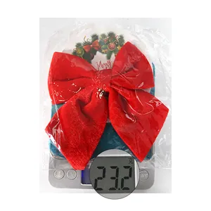 Detailed view of a red velvet Christmas bow hanging ornament weighing 23.2g for party decor