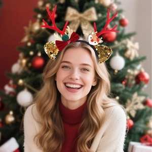 Close-up of reindeer antler headband with sequins and mini doll for Christmas parties