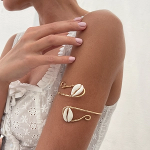 Bohemian gold arm cuffs set with white cowrie shells for women beach jewelry