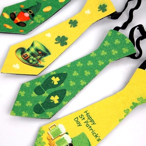Set of St. Patrick's Day green neckties with shamrocks and leprechaun prints