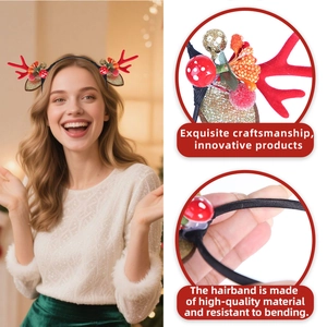 Detail showing the festive reindeer antlers headband with plush red texture and berries
