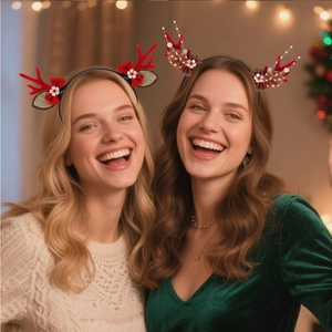 Detailed view of Christmas reindeer antler headbands with velvet ears and festive bows