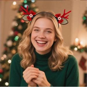 Detail of Christmas reindeer antler headband with red flocking and gold glitter ears