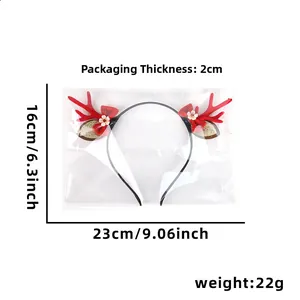 Detailed view of Christmas reindeer antler headband with size markings in packaging