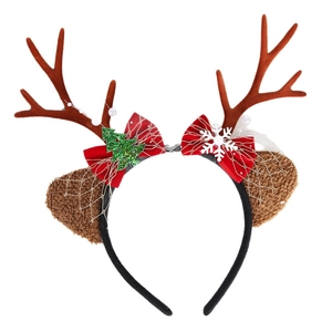 Christmas reindeer antler headband with brown plush, red bow and sparkly ornaments