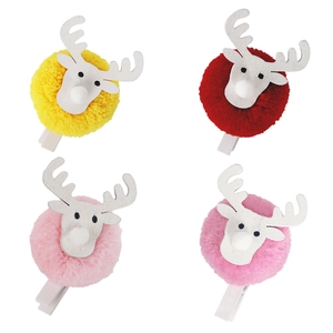 Christmas reindeer wooden clips set with colorful plush pom-poms for photo and card decor