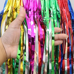 Close-up of rainbow metallic fringe curtains with a high-shine finish for party backdrops