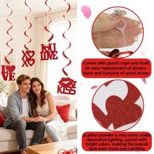 Sparkly red heart spiral decorations with LOVE and KISS letters for Valentine's Day party decor