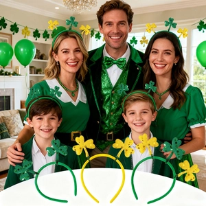 Family wearing St. Patrick's Day headbands with sparkling green and gold shamrock details