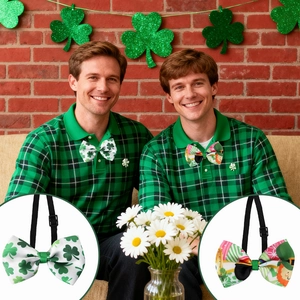 Detail of St. Patrick's Day bow ties with green shamrock patterns and adjustable straps