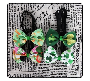 Set of four St. Patrick's Day bow ties featuring shamrock and gold coin festive patterns
