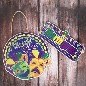 Two-piece Mardi Gras wooden door signs with carnival mask designs and hanging ropes