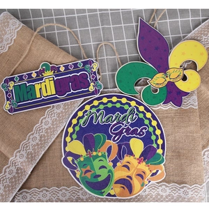 Mardi Gras hanging wood signs set with fleur-de-lis, mask and classic purple green gold colors