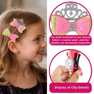 Macro detail of sparkly pink and green crown bow clips with silver sequin texture