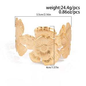 Detailed view of the gold flower cuff bracelet with dimensions and weight measurements
