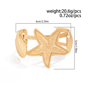 Detail of gold starfish and shell cuff bracelet with precise weight and size dimensions