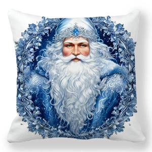 Détail de l'imprimé Père Noël sur une taie d'oreiller bleue avec motifs de couronne
