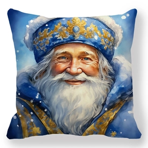 Détail de la housse de coussin de Noël bleue avec imprimé artistique du Père Noël