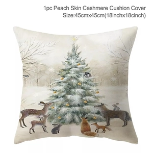Christmas cushion cover featuring festive forest animals and a tree on peach skin fabric