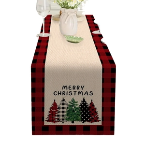 Linen Christmas table runner with red black plaid borders and festive tree prints