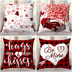 Set of four Valentine's Day pillow covers featuring hearts, buffalo plaid, and retro truck