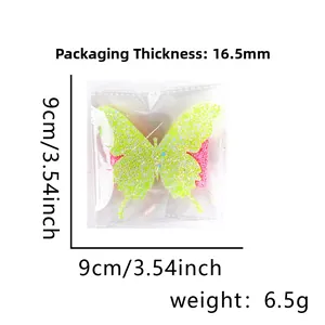 Close-up of yellow glitter butterfly hair clip with dimensions and 16.5mm packaging thickness