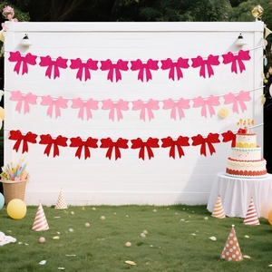 Red and pink felt bow banners for Valentine's Day party and wedding backdrop decor