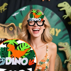 Detail of cartoon dinosaur party glasses featuring felt decorations and DINO lettering
