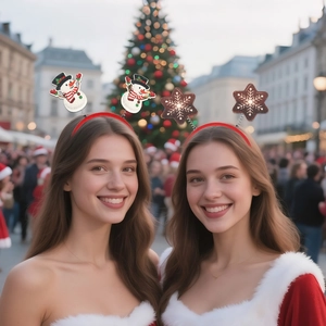 Detail of festive Christmas headbands with snowman and snowflake icons on red springs
