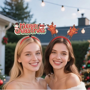 Detail of Merry Christmas headband and reindeer hair hoop worn in a festive party setting