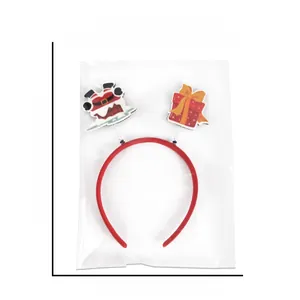 Detailed dimensions of Christmas headband in packaging showing 26cm height and 19.5cm width