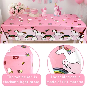 Close-up of pink unicorn party tablecloth showing thick PET material and rainbow prints