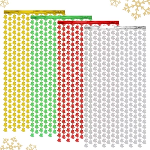 Detail of Christmas tinsel curtains in gold, green, red and silver snowflake patterns