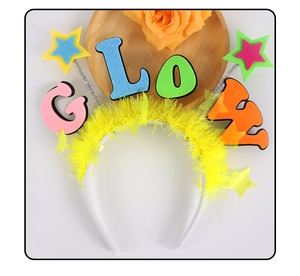 Detail of yellow plush GLOW headband with colorful letters on springs for neon parties
